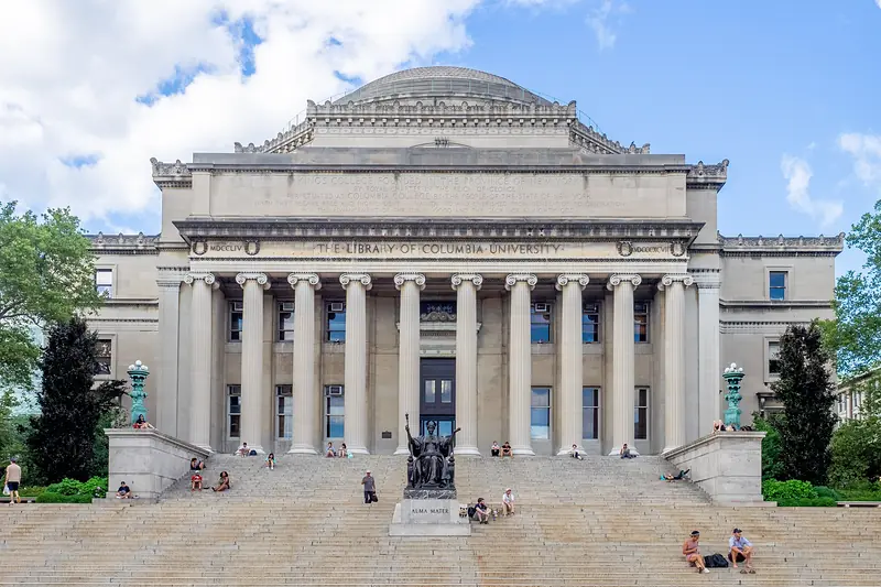 Low Memorial Library at Columbia University in New York, with students on its steps.